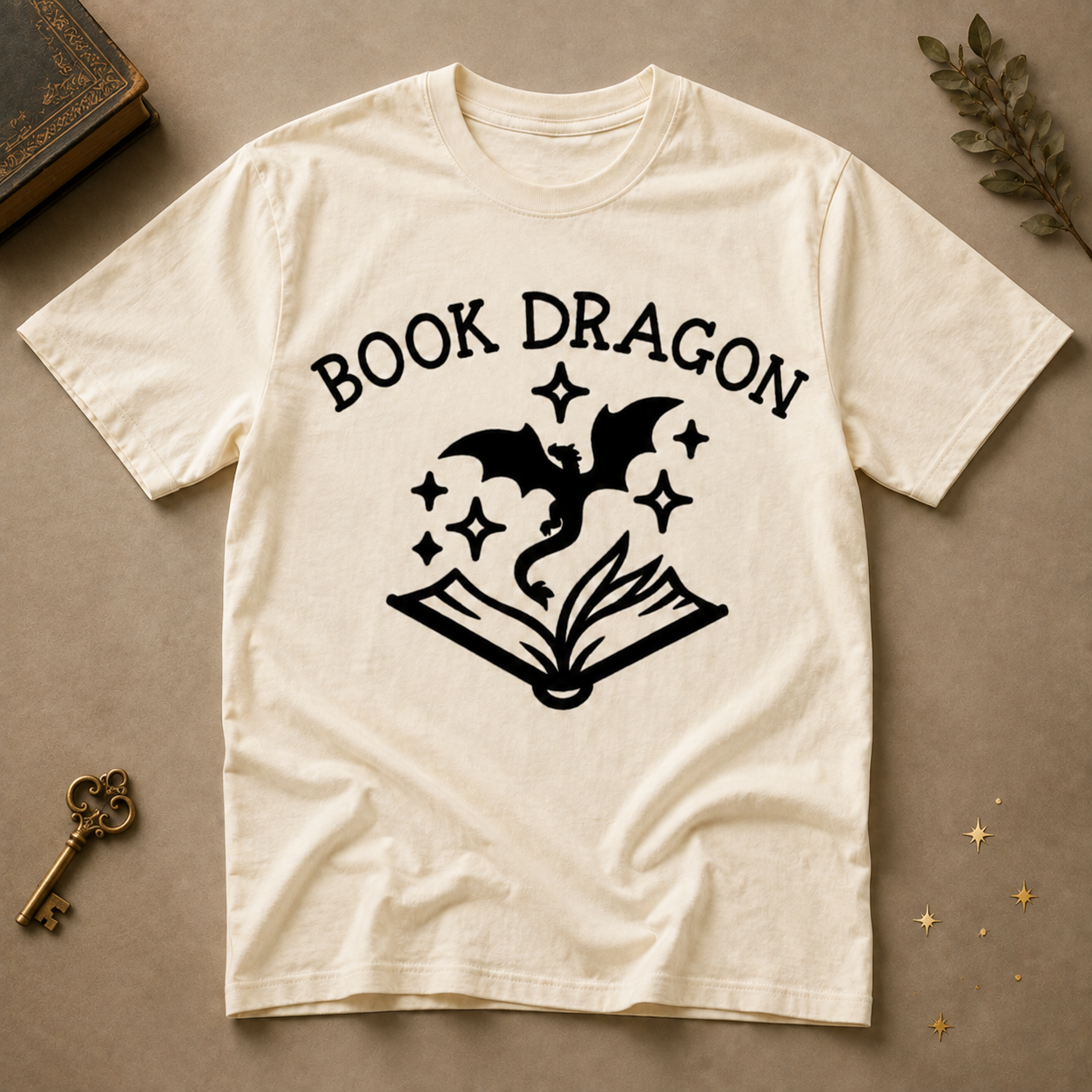 Cream Book Dragon T-shirt with black dragon and open-book design