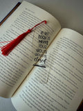 Bookish quote bookmark with red tassel and closed-mouth message