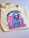 Cream tote bag with Just One More Chapter reader artwork
