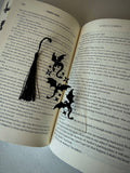 Black dragon and bat silhouette bookmark with a black tassel