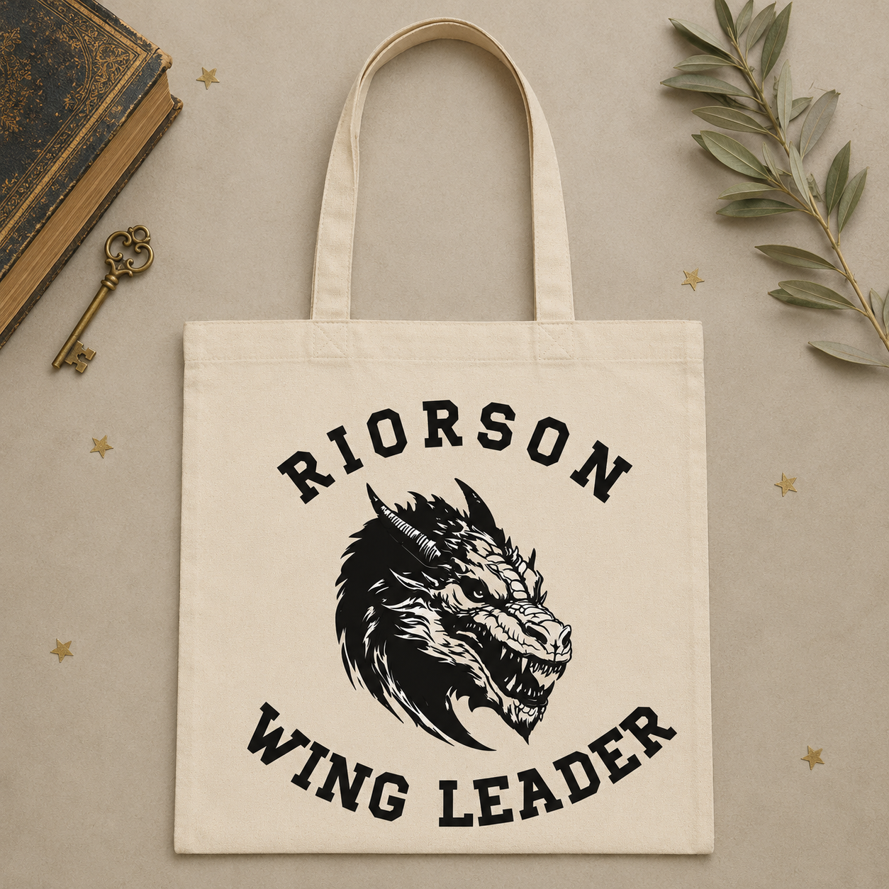 Cream Riorson Wing Leader tote bag with black dragon graphic